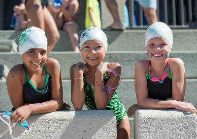 Three Greenmeadow Marlins swimmers